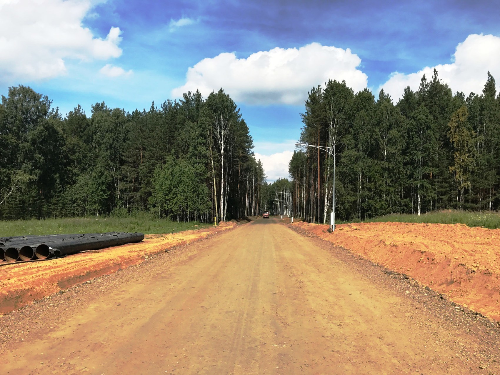 Продолжается строительство дорог в поселке "Рысь" №3